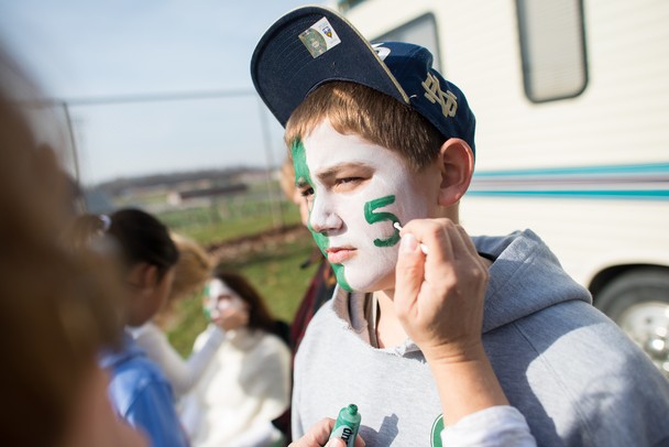 Jack Jonson the younger brother of The Fighting Irish's Matt Johnson has his brothers number painted on his face before Saturday afternoons Division 5 state semifinals game against Portland high school.Courtney Sacco I AnnArbor.com 